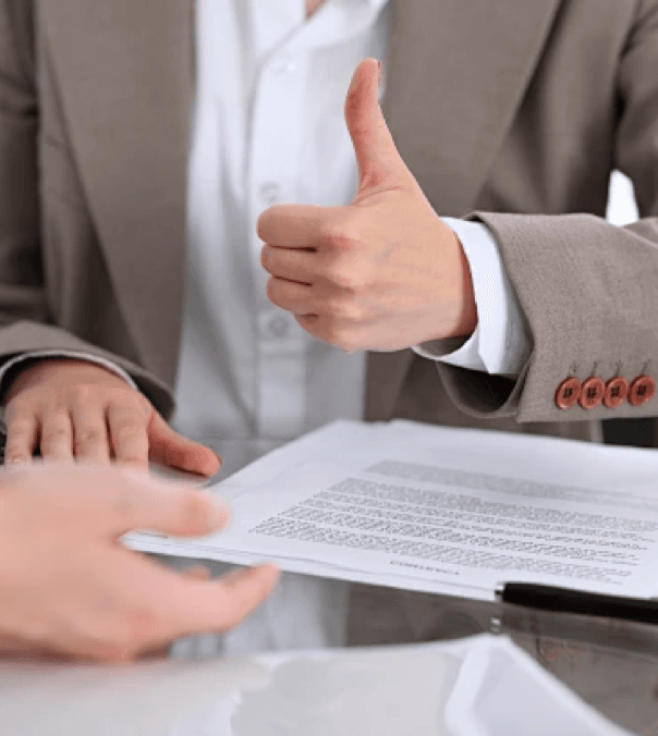 Business handshake and documents